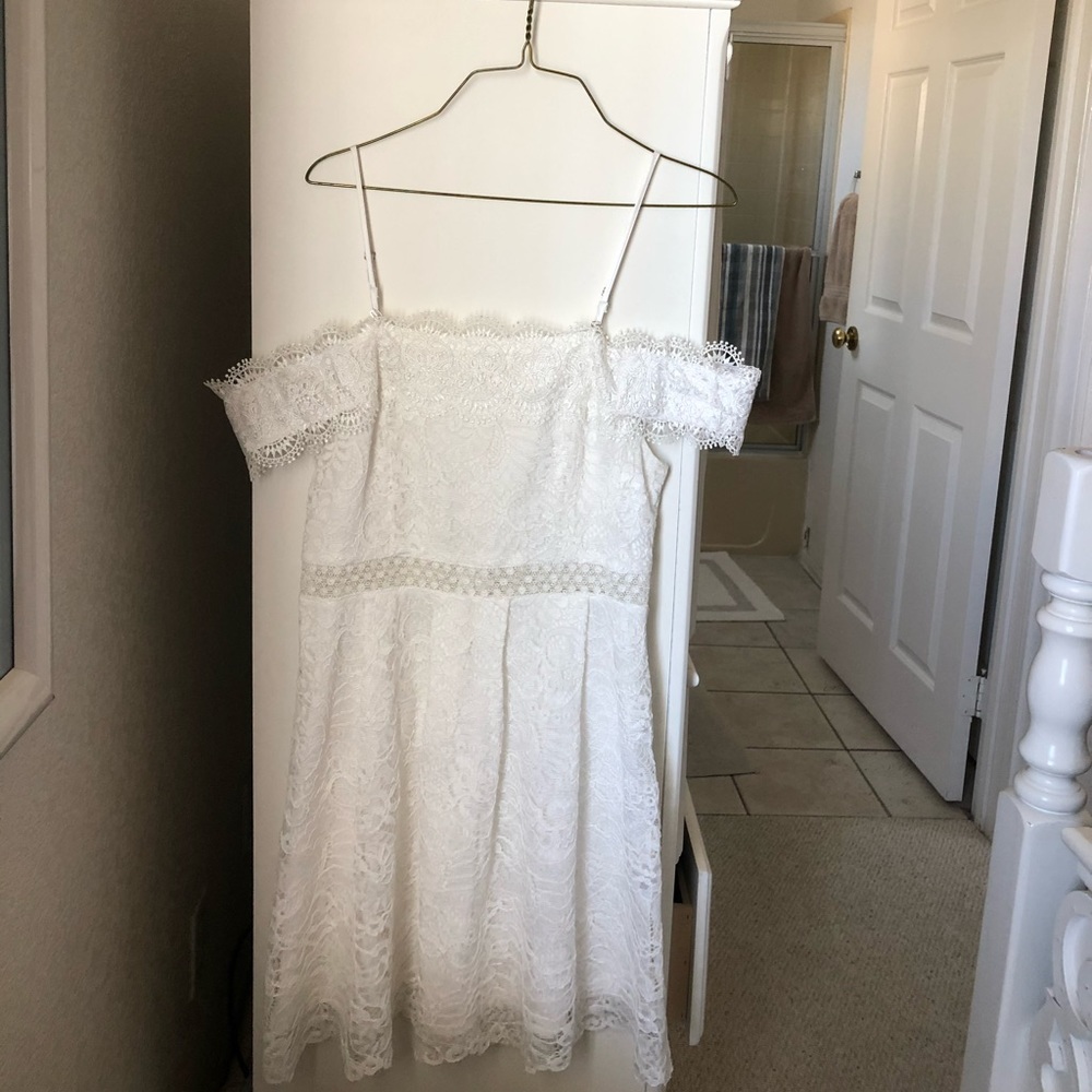 Francesca’s white laced dress